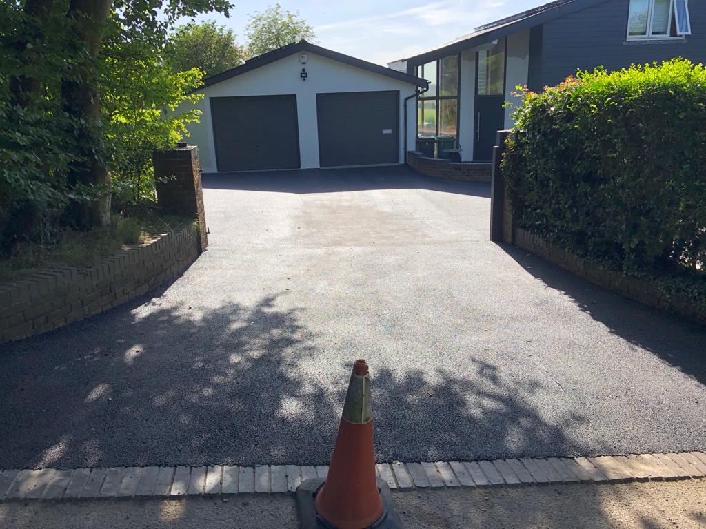 This is a photo of a bitumen driveway which is in the process of being installed by Albury Road Tech